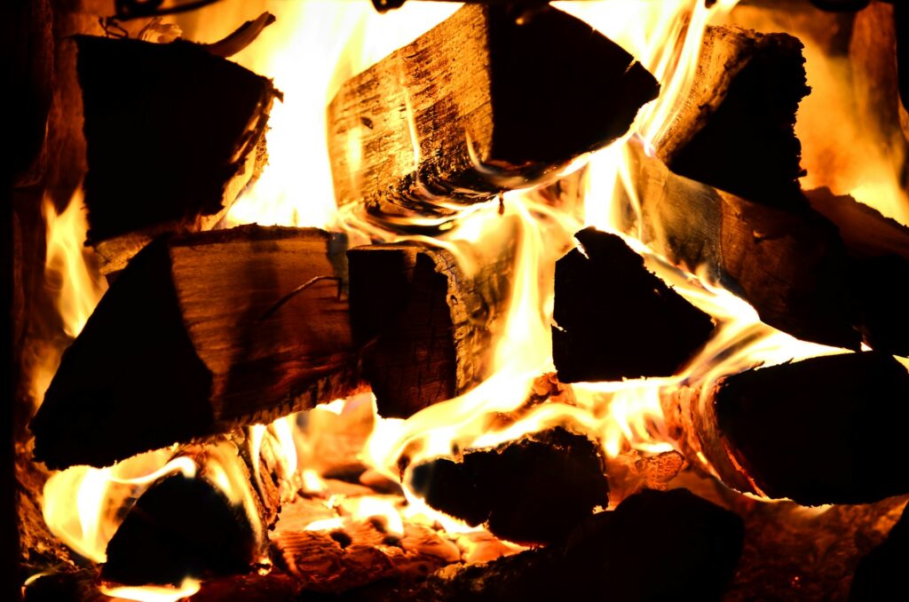 Logs on fire in a fireplace